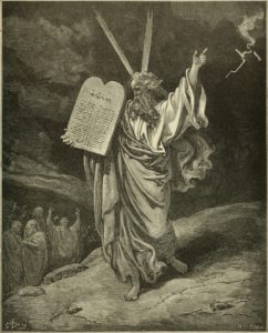 Engraving of Moses holding the Ten Commandments.