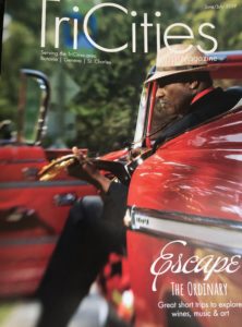 Magazine cover with headline, Escape the Ordinary